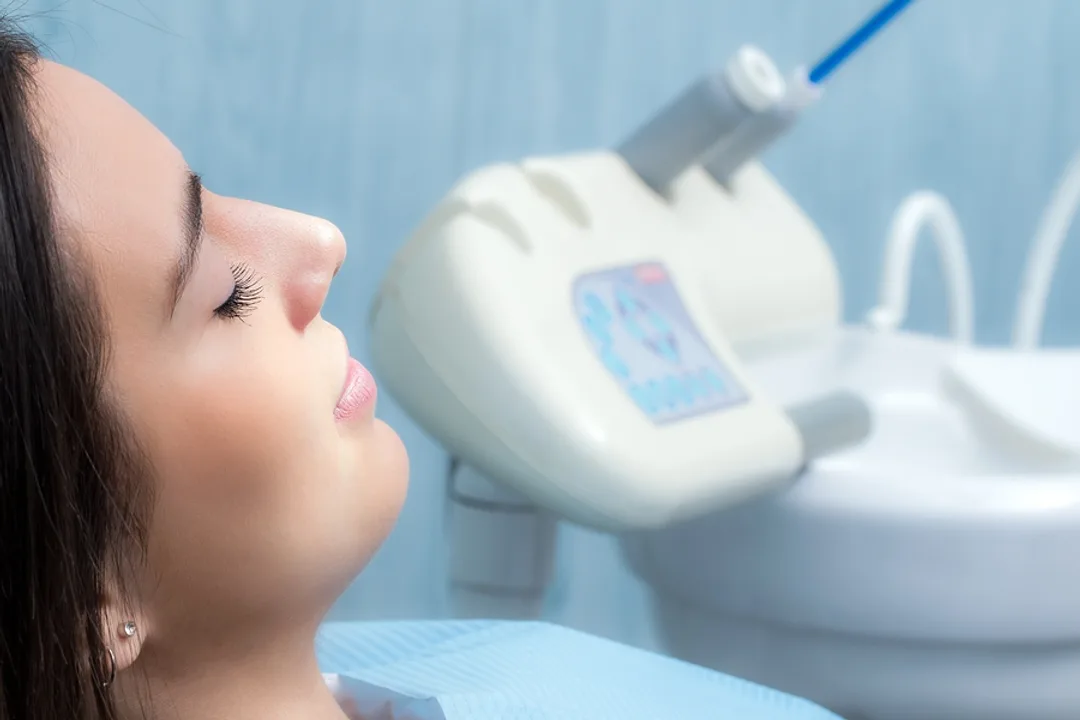 A relaxed dental patient resting comfortably under a warm blanket during treatment